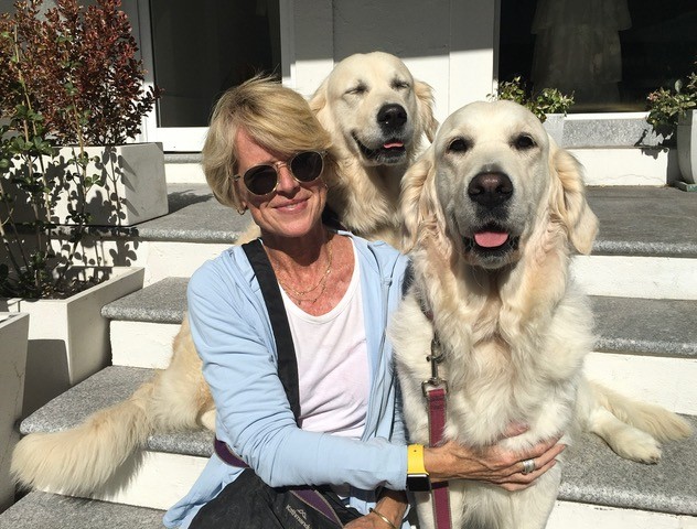 VSA-certified dog trainer Kent LaRue with his two dogs and guitar